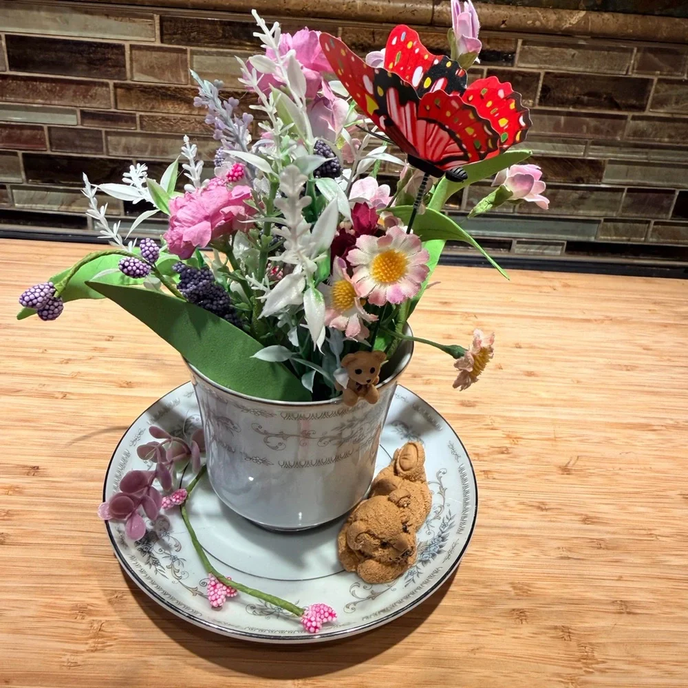 Floral Arrangement in a vintage teacup and saucer with Butterfly Accent - Picture 2 of 6